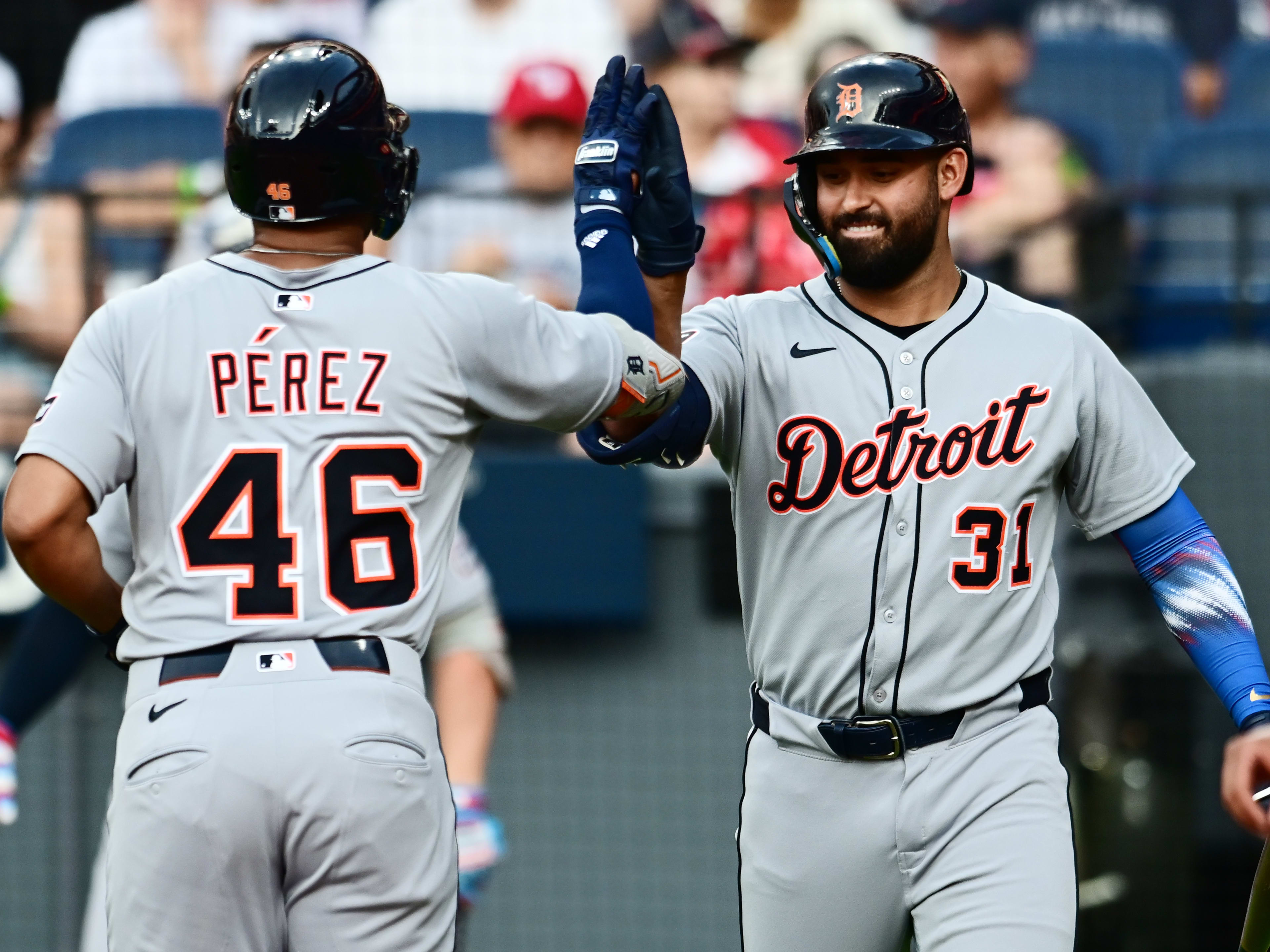 Detroit Tigers right fielder Wenceel Perez  celebrates with designated hitter Riley Greene after hitting a home run against the Cleveland Guardians at Progressive Field. 