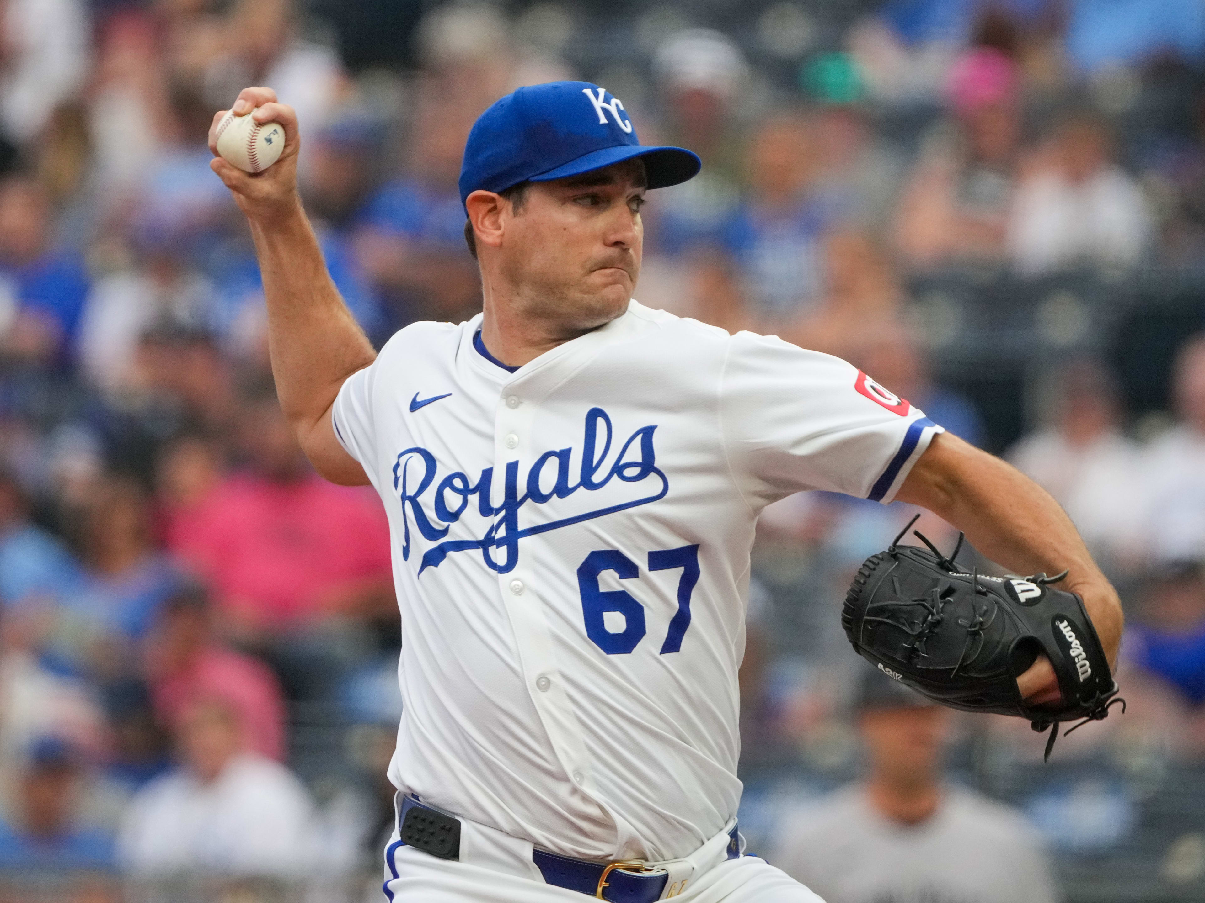 Kansas City Royals starting pitcher Seth Lugo (67) delivers a pitch against the New York Yankees in the first inning at Kauffman Stadium.