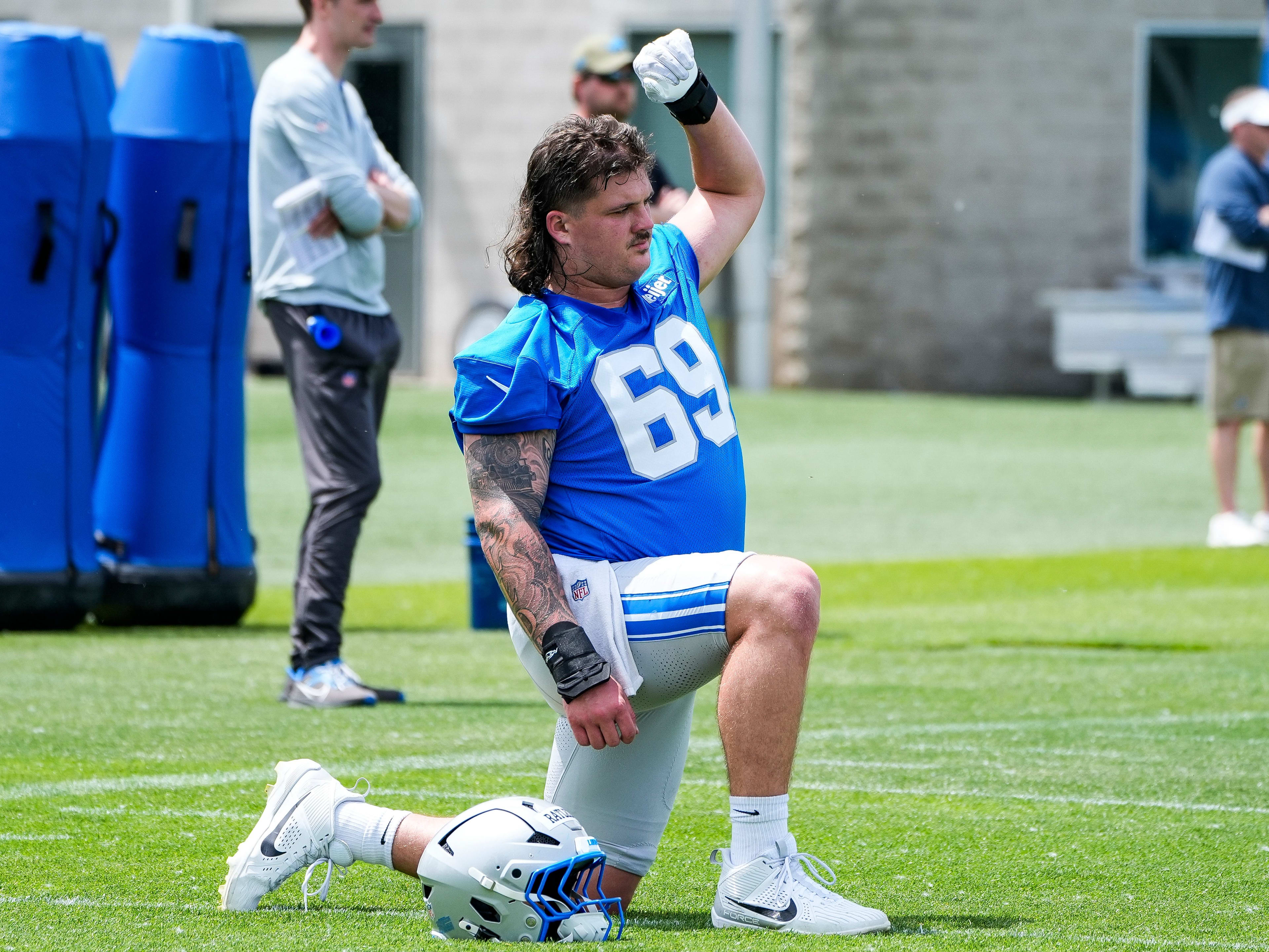 Detroit Lions guard Tate Ratledge (69) practices during OTA at Meijer Performance Center in Allen Park on Friday, May 30, 2025.