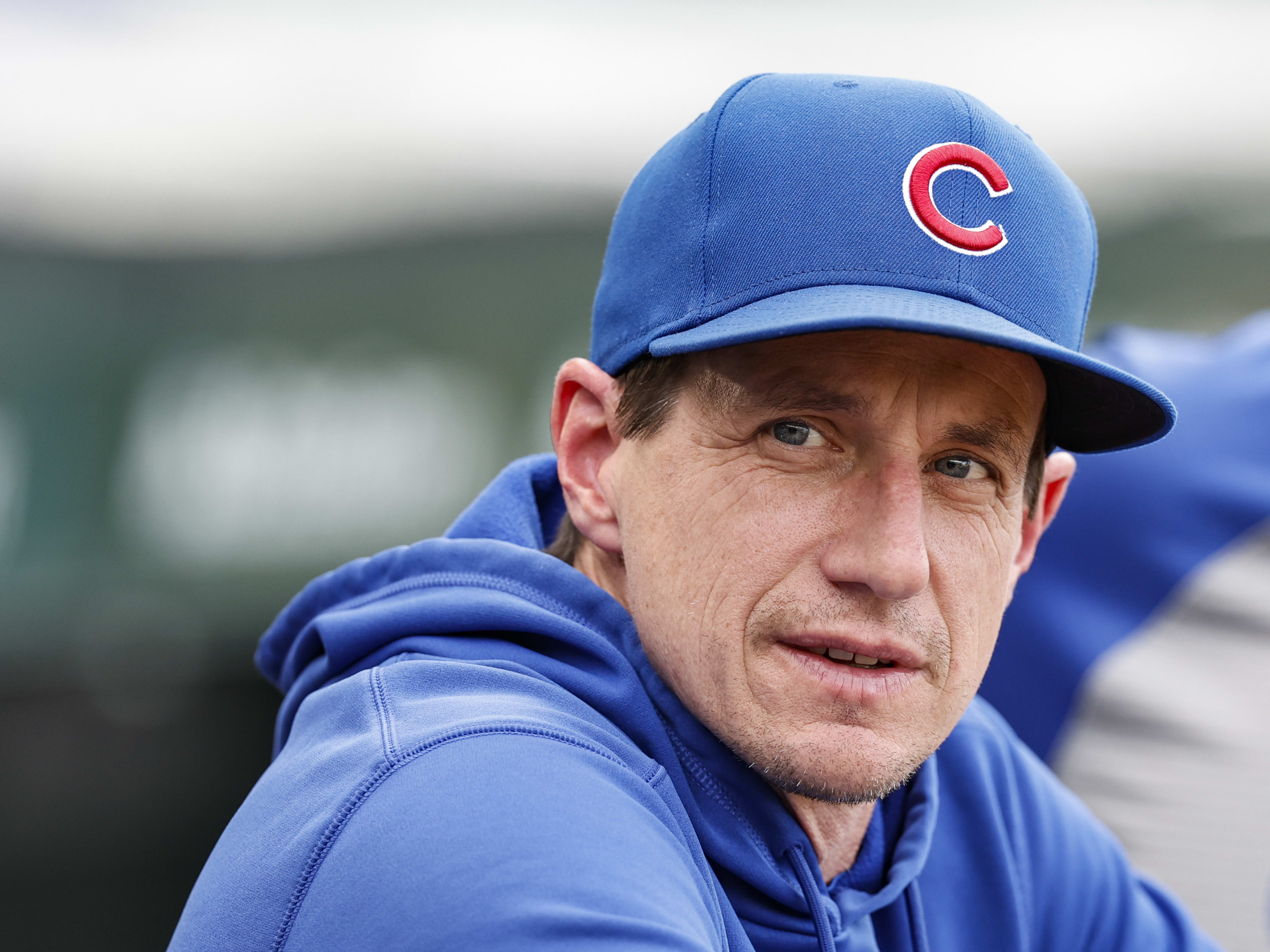 Chicago Cubs manager Craig Counsell (30) looks on from dugout before a baseball game against the Atlanta Braves at Wrigley Field.