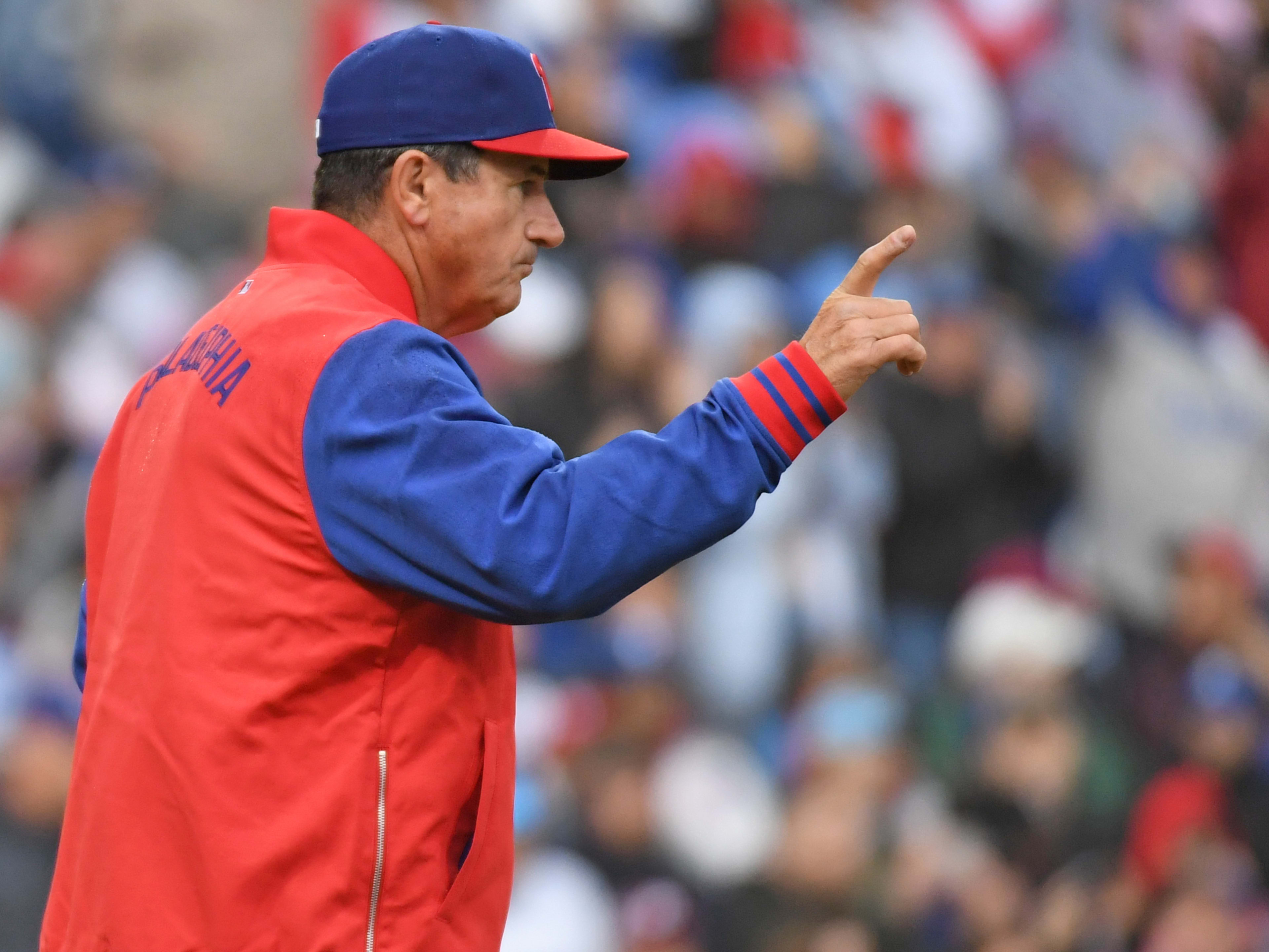 Apr 6, 2025; Philadelphia, Pennsylvania, USA; Philadelphia Phillies manager Rob Thomson (59) makes a pitching change during the seventh inning against the Los Angeles Dodgers at Citizens Bank Park.