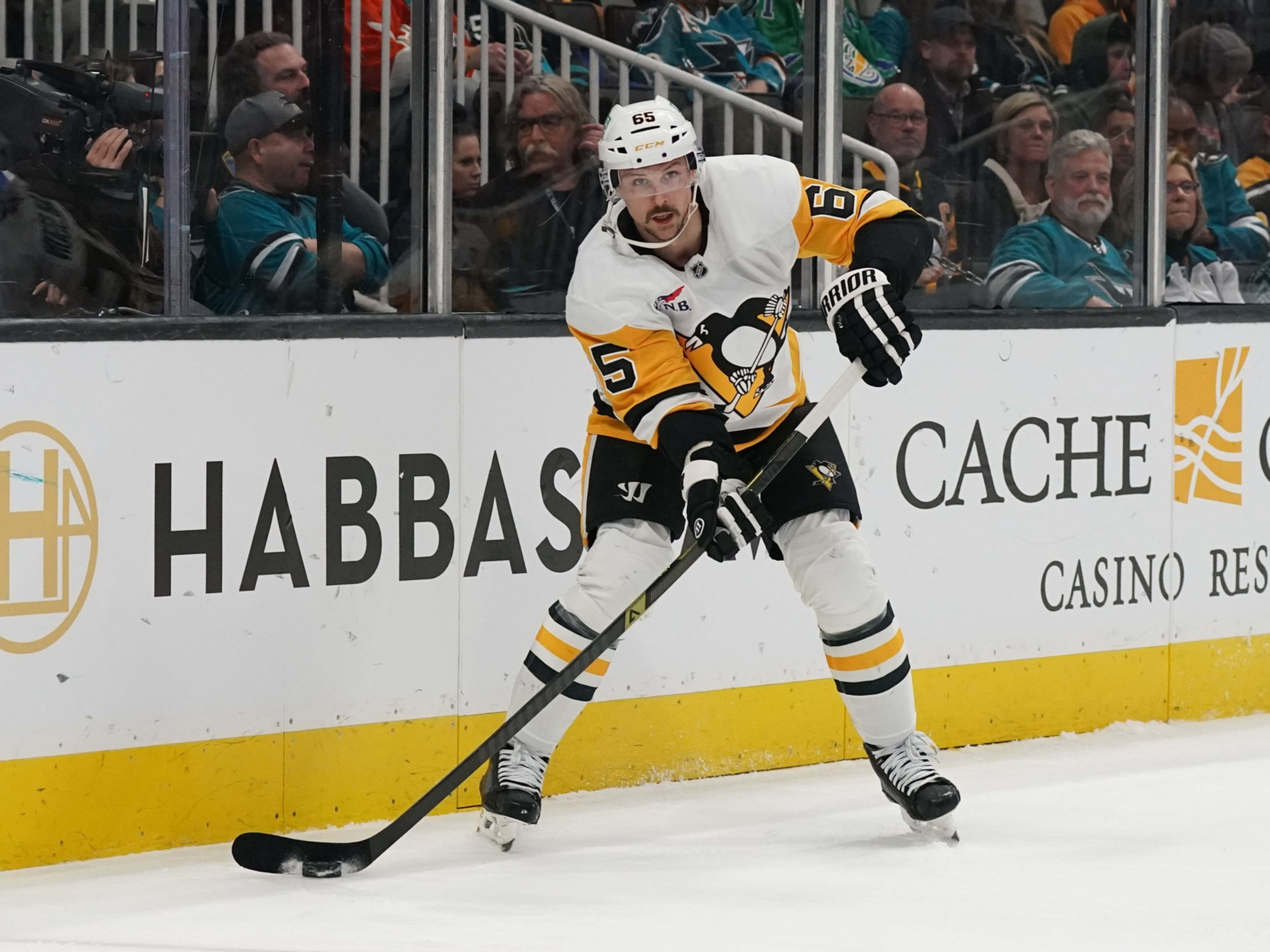 Jan 27, 2025; San Jose, California, USA;  Pittsburgh Penguins defenseman Erik Karlsson (65) looks to make a pass during the second period against the San Jose Sharks at SAP Center at San Jose. Mandatory Credit: David Gonzales-Imagn Images
