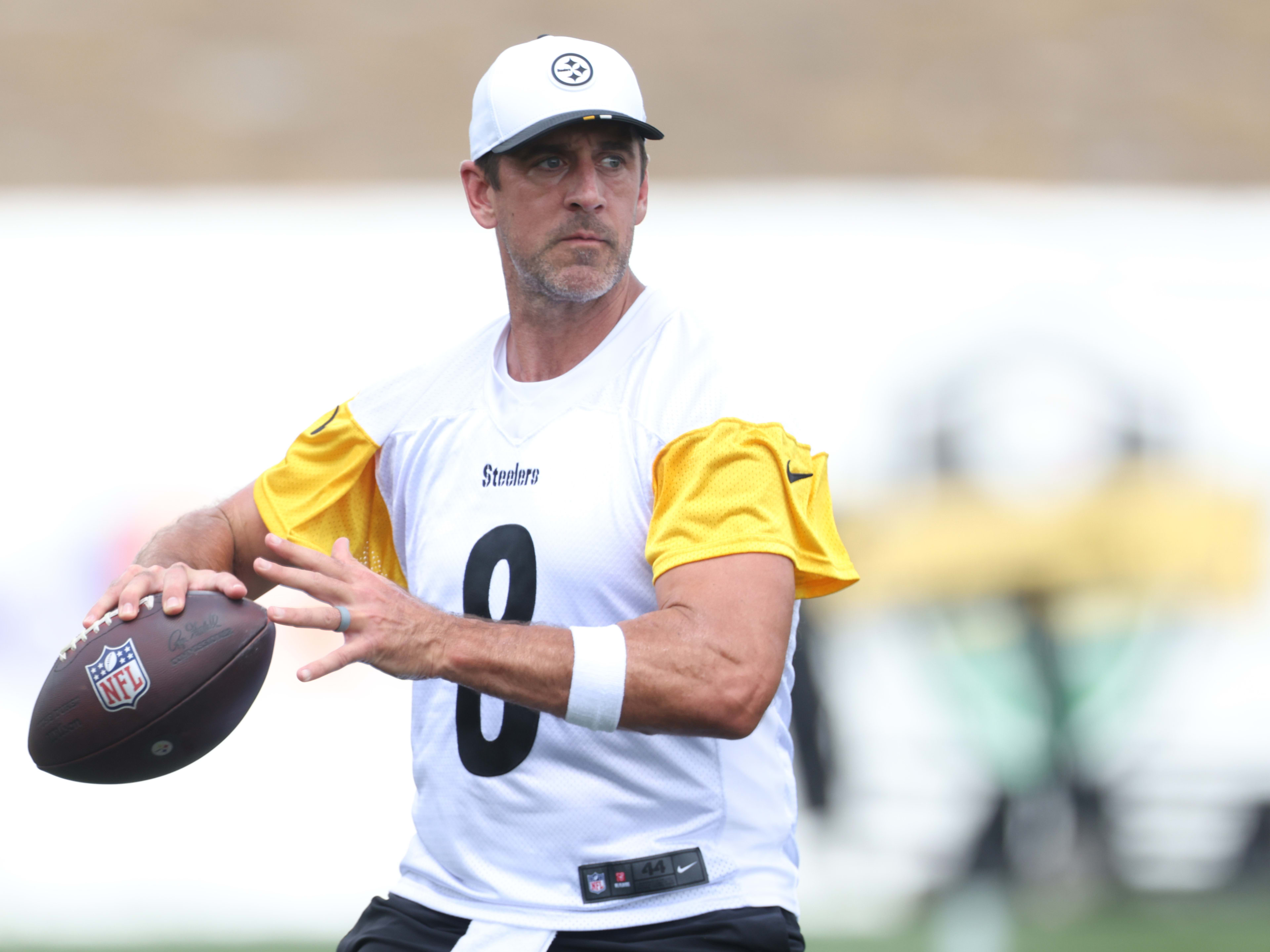 Pittsburgh Steelers quarterback Aaron Rodgers (8) participates in drills during training camp at Saint Vincent College.
