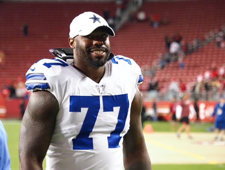 Former Dallas Cowboys offensive tackle Tyron Smith leaves the field