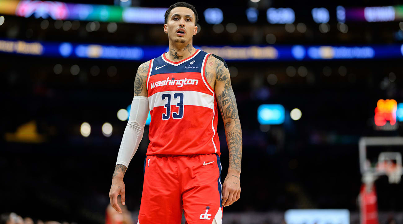 Washington Wizards forward Kyle Kuzma looks on
