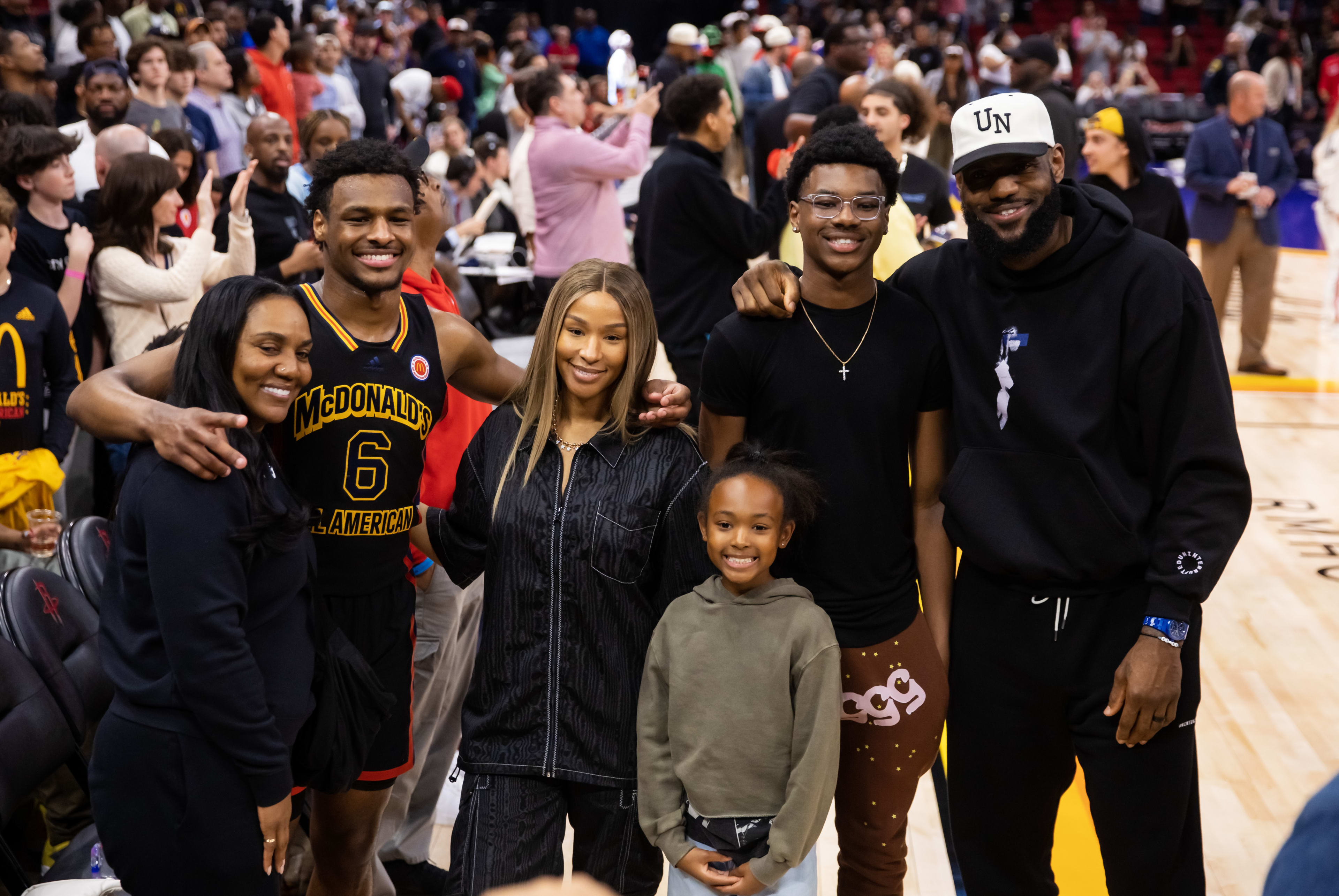 LeBron James with his wife Savannah, mother Gloria, and three children Bronny, Bryce and Zhuri.