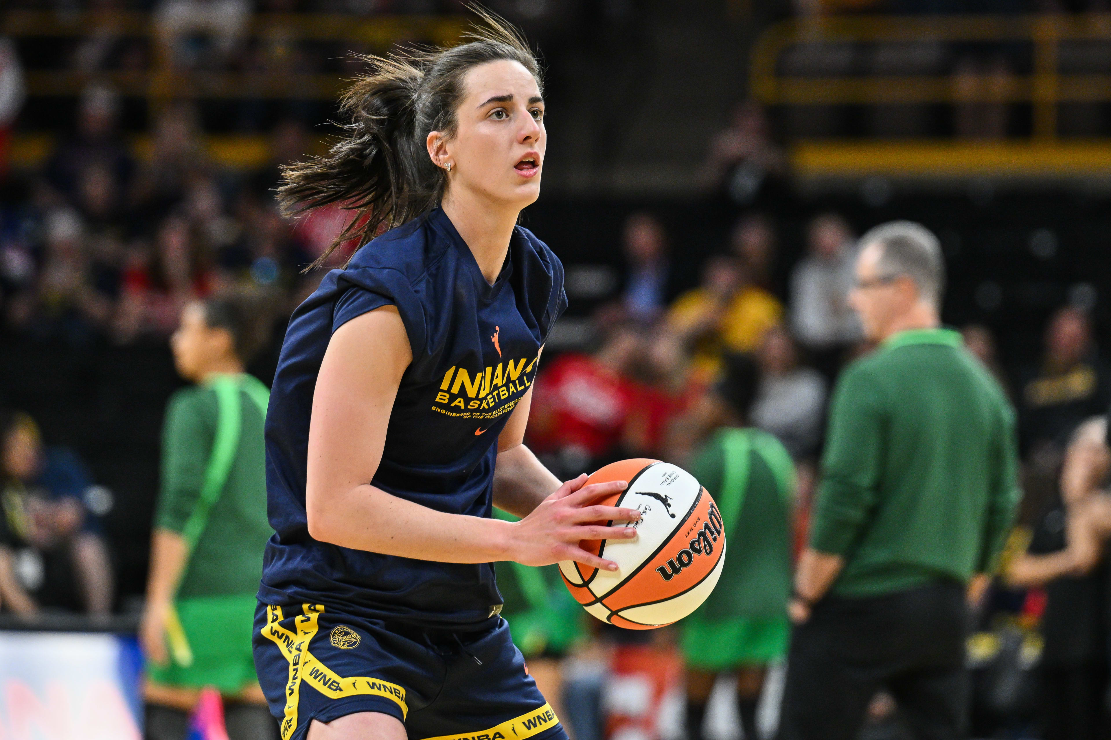 Fever's Caitlin Clark Lights Up Carver-Hawkeye Arena With Pregame Shooting  Display - Athlon Sports