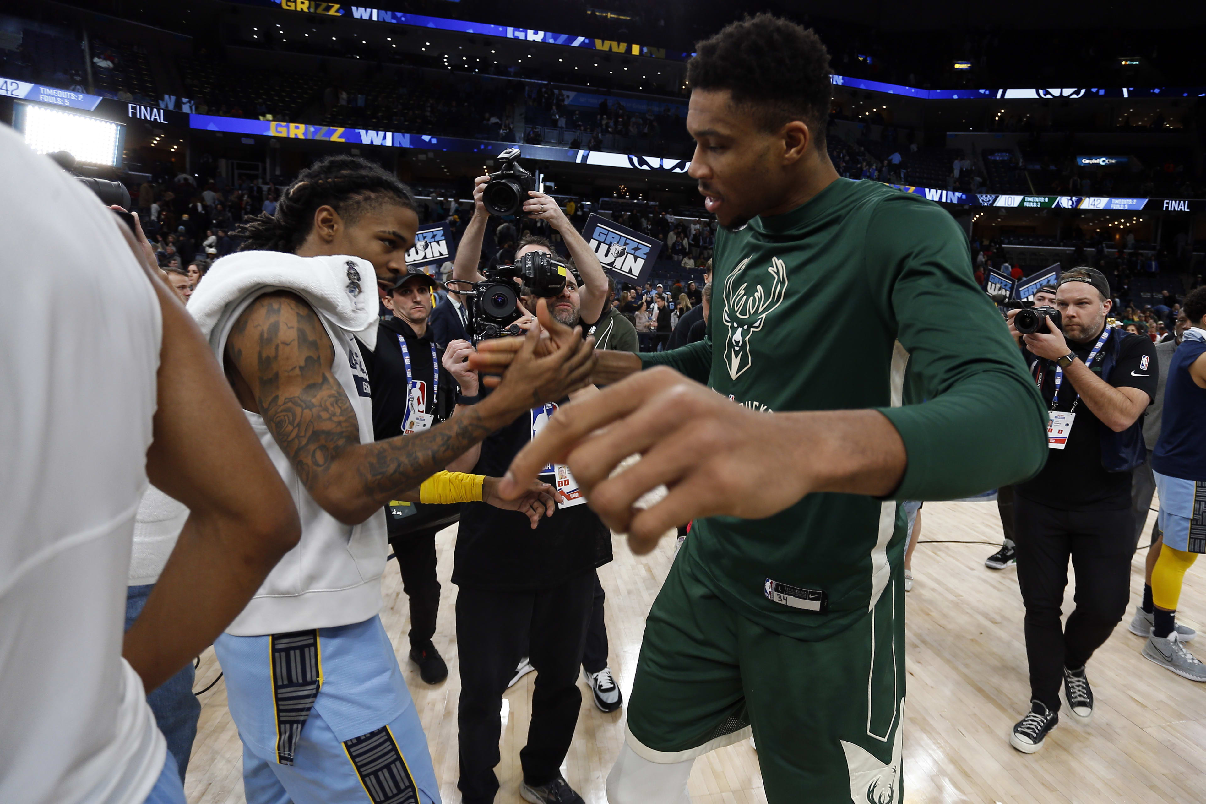 Memphis Grizzlies guard Ja Morant and Milwaukee Bucks forward Giannis Antetokounmpo