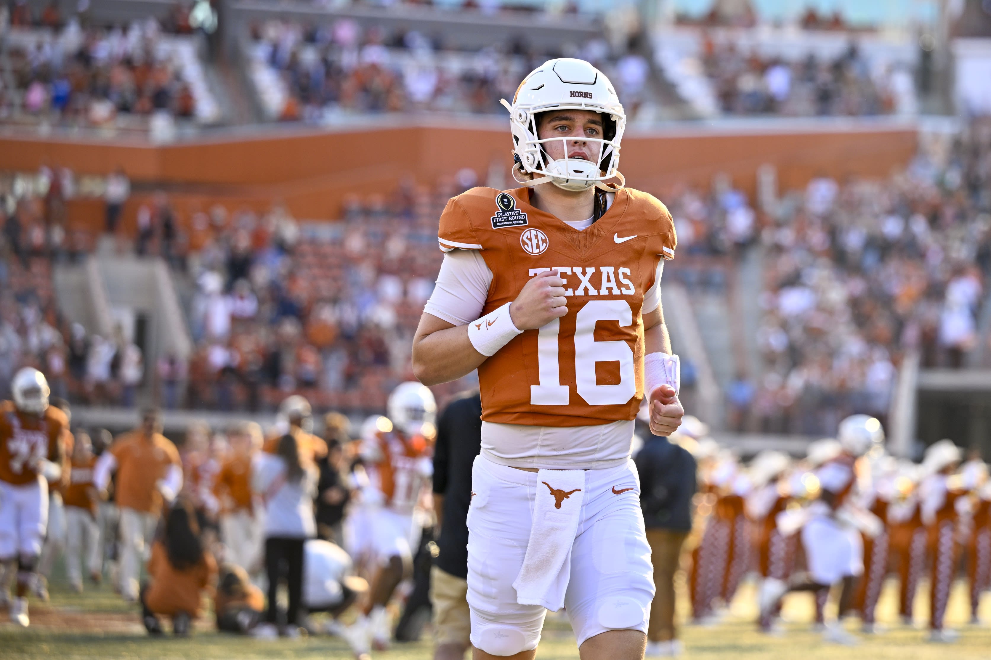 Texas Longhorns quarterback Arch Manning takes the field before his team's College Football Playoff game against the Clemson Tigers at Darrell K Royal-Texas Memorial Stadium on Dec. 21, 2024.