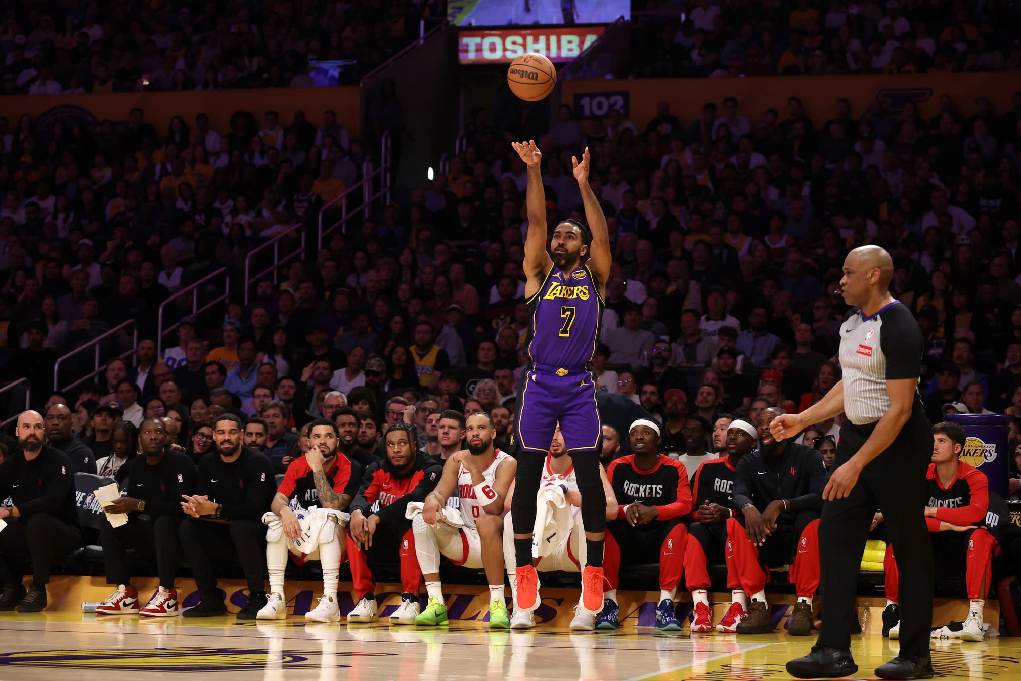 Los Angeles Lakers guard Gabe Vincent rises to take a 3-point shot against the Houston Rockets at Crypto.com Arena on March 31, 2025.