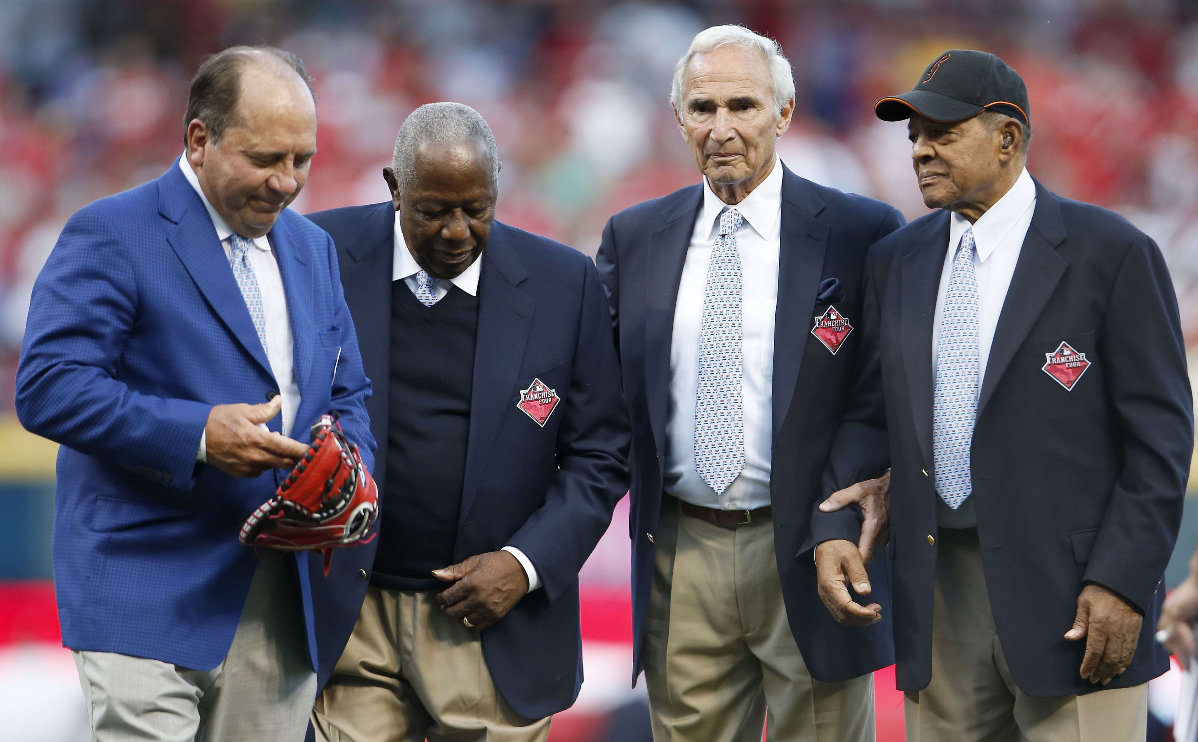  Johnny Bench, Hank Aaron, Sandy Koufax and Willie Mays walk off the field after being honored as the greatest living baseball players prior to the 2015 MLB All-Star Game, Tuesday, July 14, 2015, at Great American Ball Park.