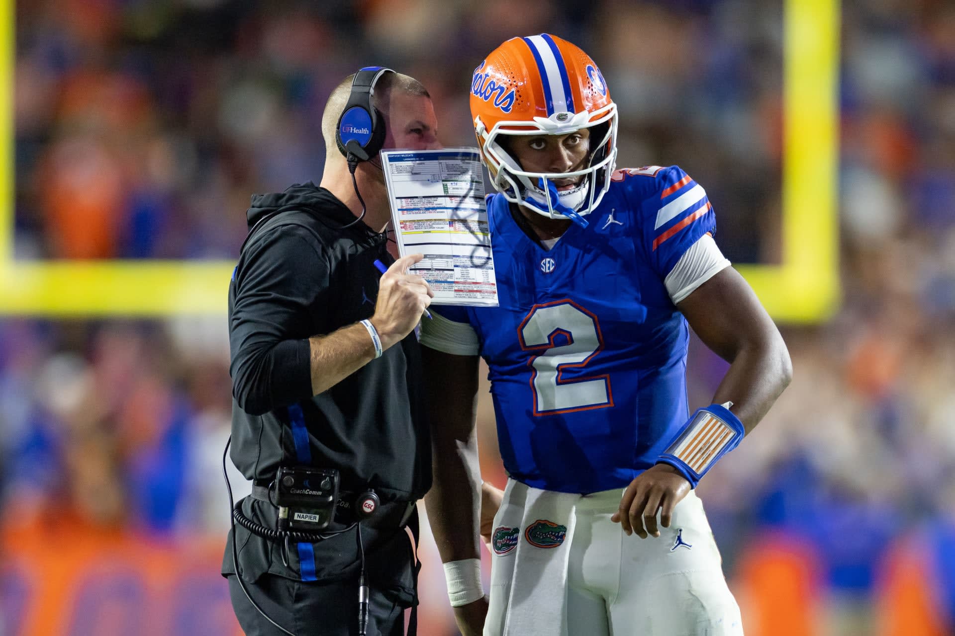 Florida Gators QB DJ Lagway standing beside head coach Billy Napier