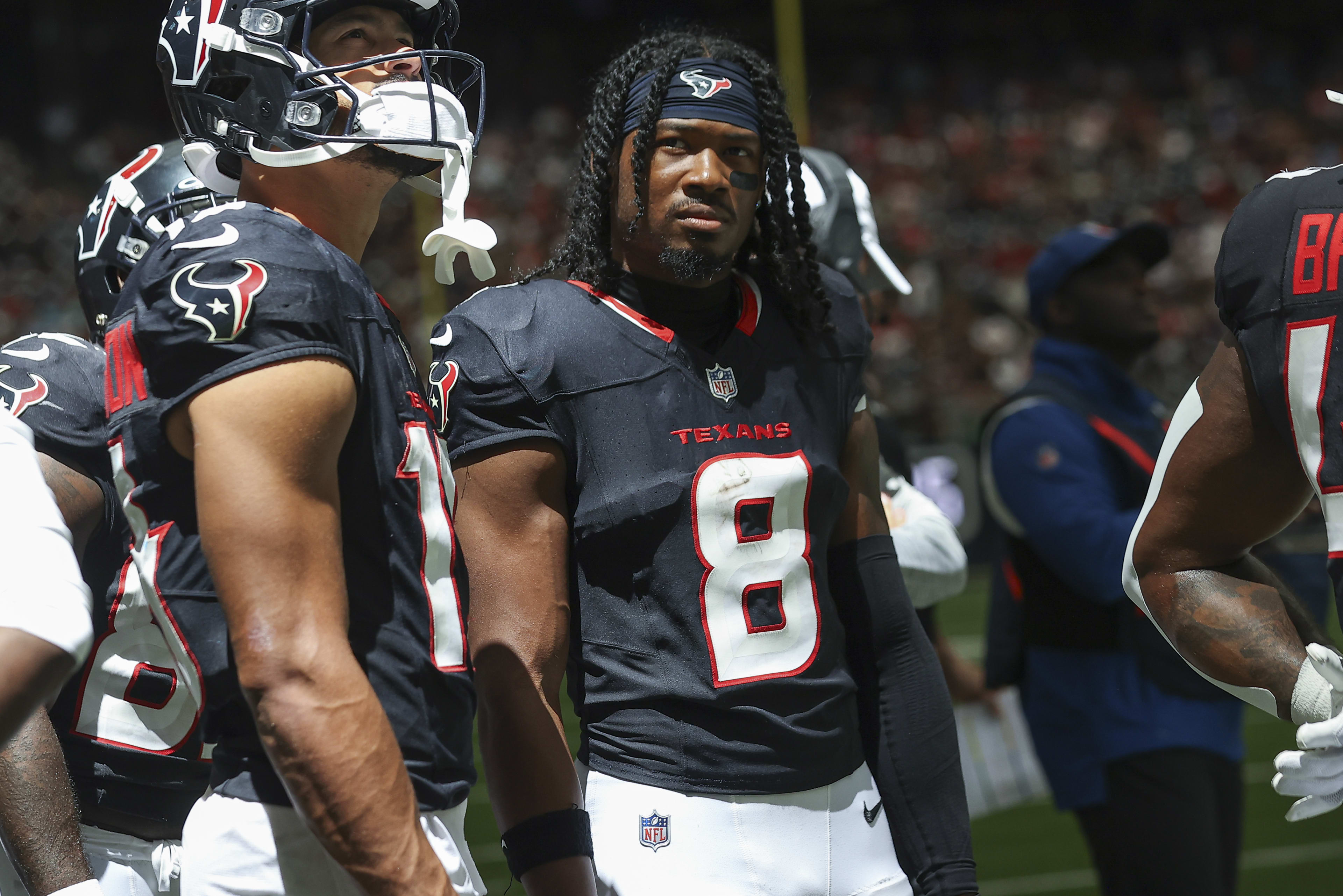 Aug 24, 2024; Houston, Texas, USA; Houston Texans wide receiver John Metchie III (8) on the sideline during the game against the Los Angeles Rams at NRG Stadium.
