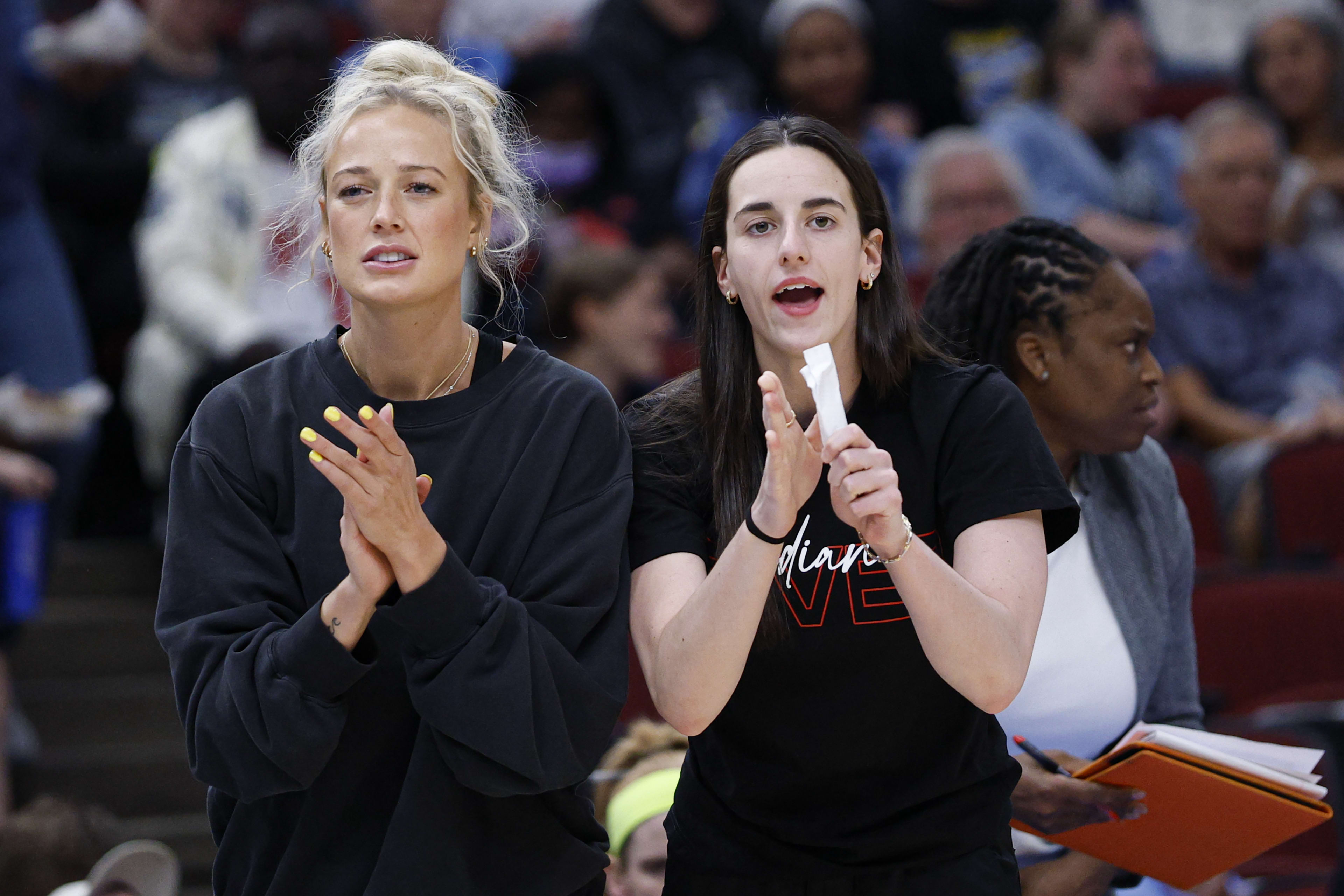 Indiana Fever guards Sophie Cunningham and guard Caitlin Clark