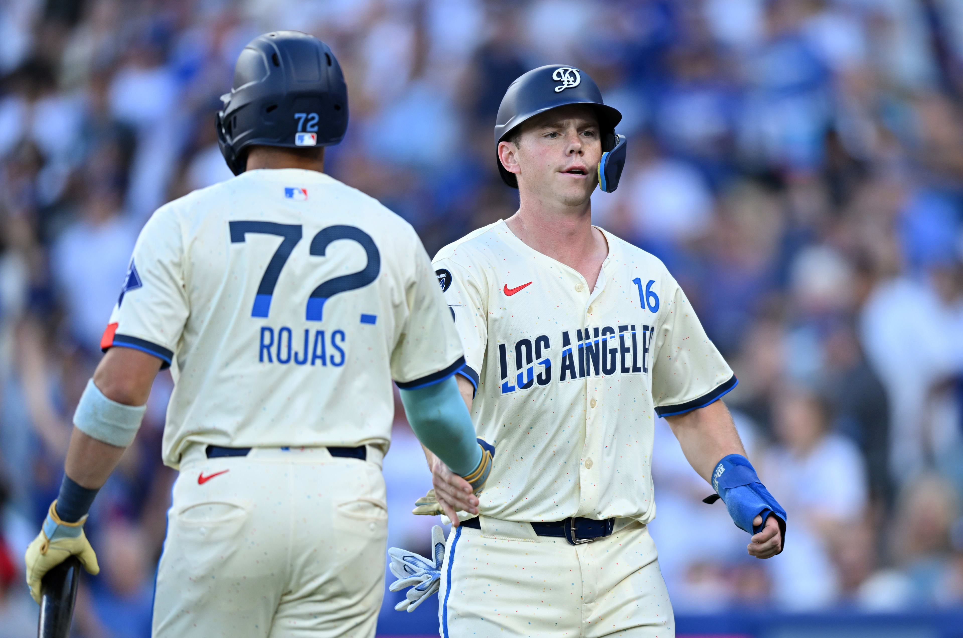 Miguel Rojas (L) and Will Smith should both be in the Los Angeles Dodgers' postseason lineups