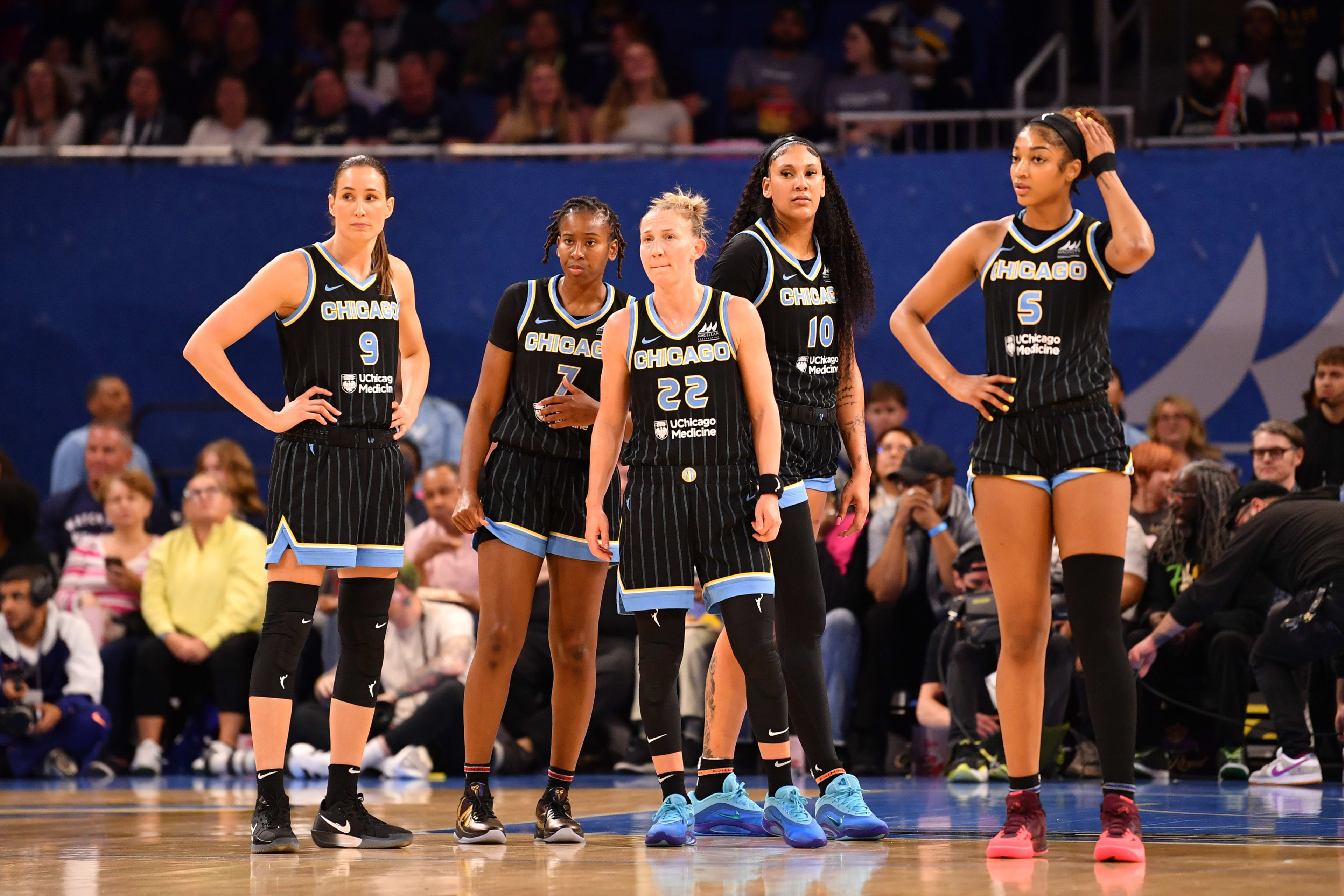 Chicago Sky guard Rebecca Allen (9), guard Ariel Atkins (7), guard Courtney Vandersloot (22), center Kamilla Cardoso (10), and forward Angel Reese (5).