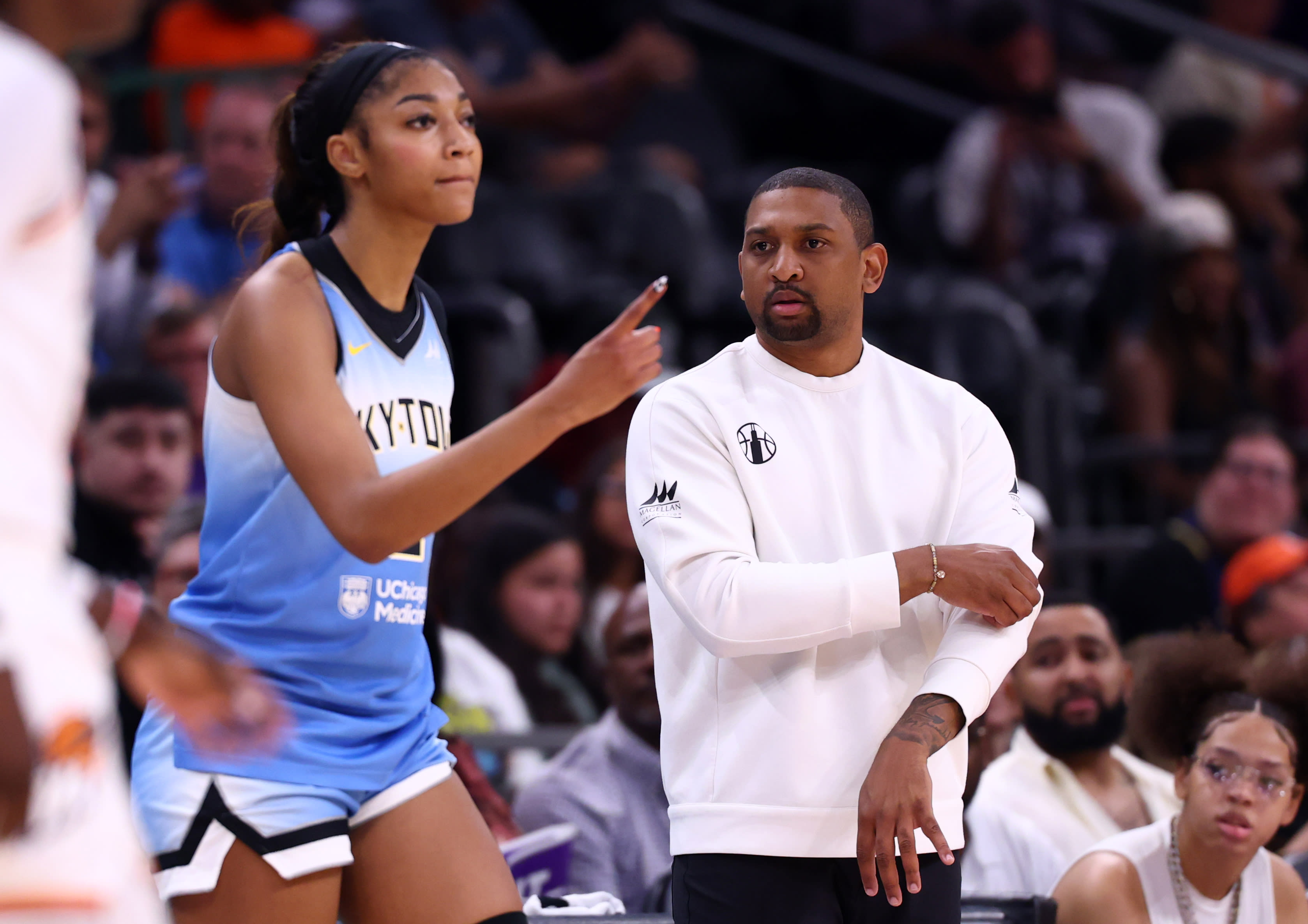 Chicago Sky forward Angel Reese (5) and head coach Tyler Marsh.