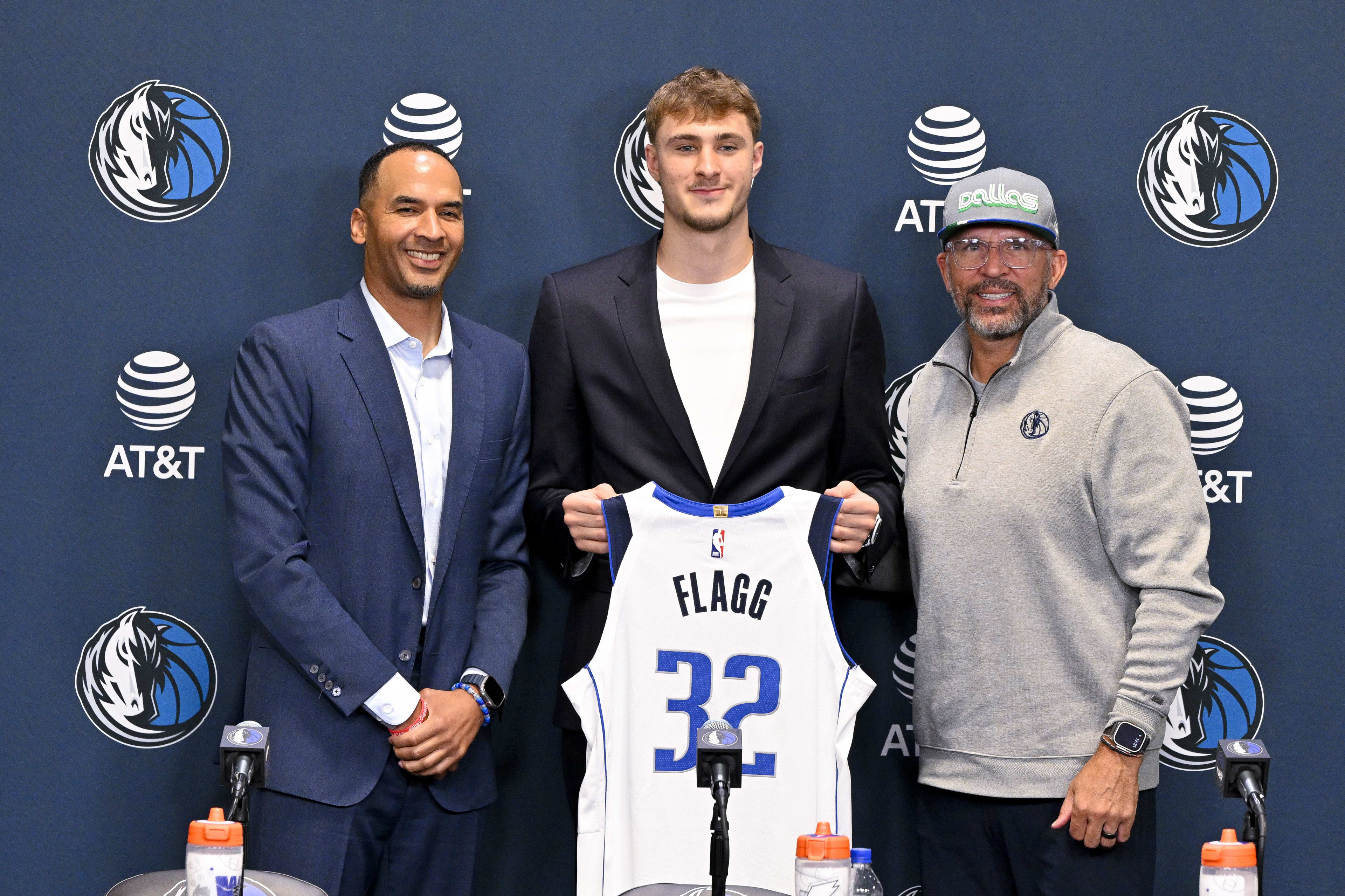 New Dallas Mavericks star Cooper Flagg alongside the team's general manager Nico Harrison and head coach Jason Kidd.