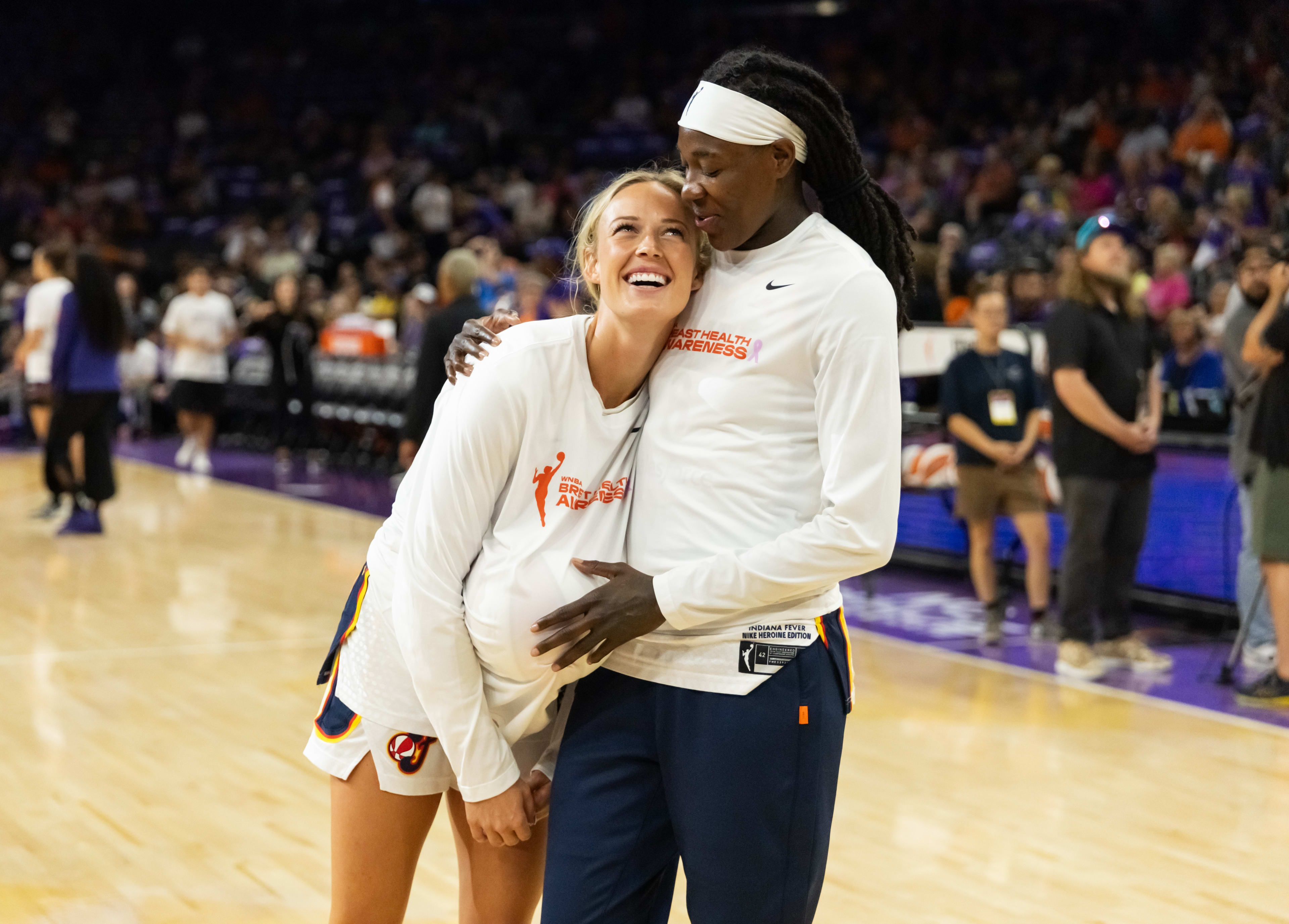 Indiana Fever guard Sophie Cunningham (left) with forward Natasha Howard.