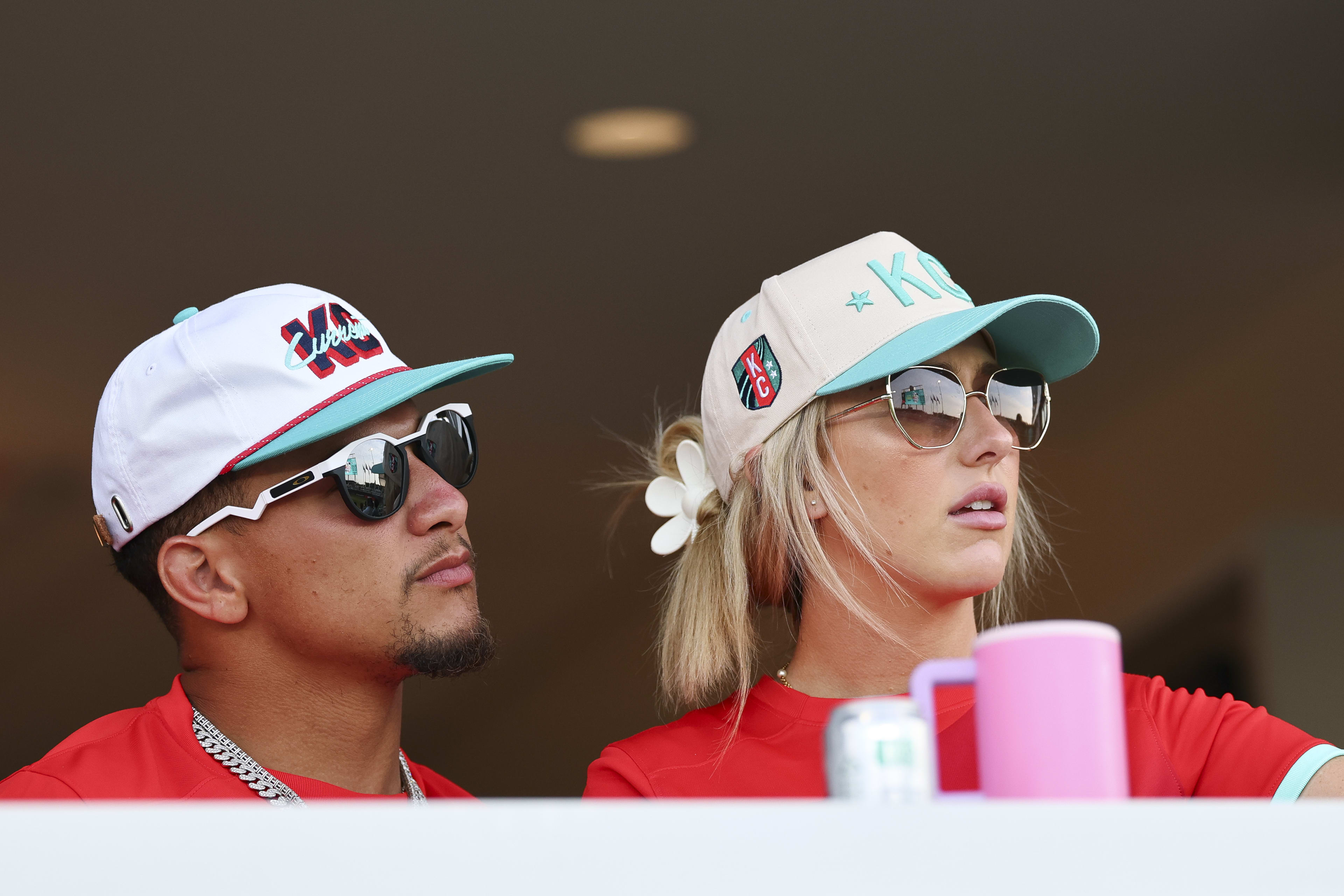 Co-owners Patrick Mahomes of the Kansas City Chiefs and Brittany Mahomes watch from a suite during the NWSL match between Kansas City Current and Racing Louisville at CPKC Stadium on June 14, 2025 in Kansas City, Missouri.