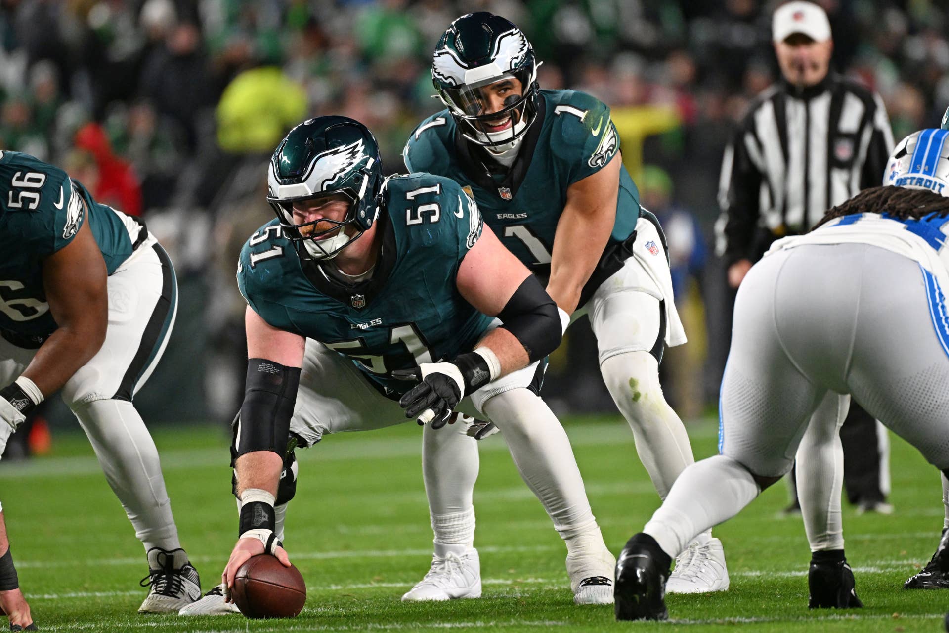 Philadelphia Eagles quarterback Jalen Hurts (1) and center Cam Jurgens (51)
