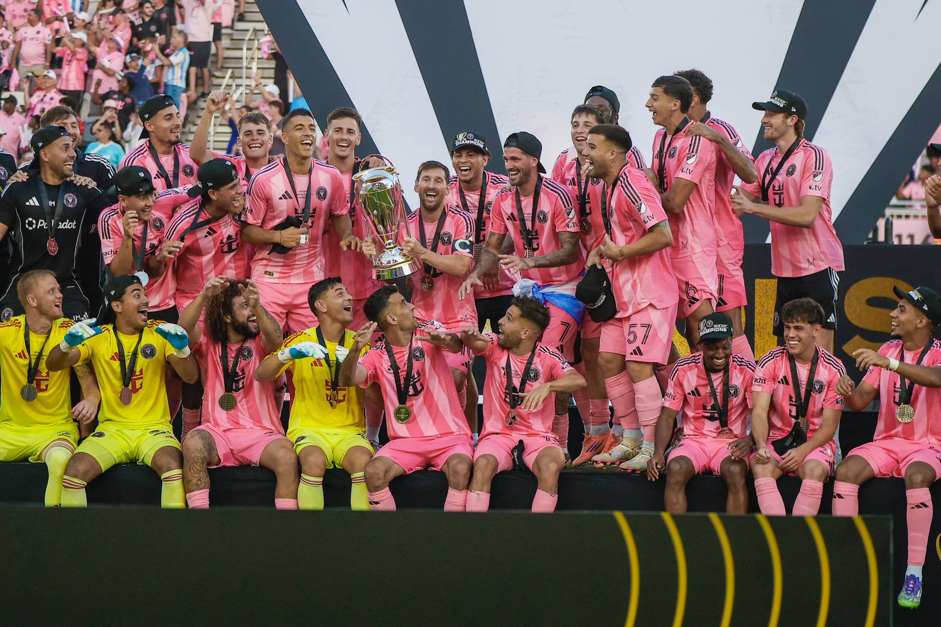 Inter Miami forward Lionel Messi (10) and the rest of the Inter Miami team celebrate with the MLS Cup following the 2025 MLS Cup Finals between the Vancouver Whitecaps and Inter Miami CF on Saturday, December 6, 2025, at Chase Stadium in Fort Lauderdale, FL.
