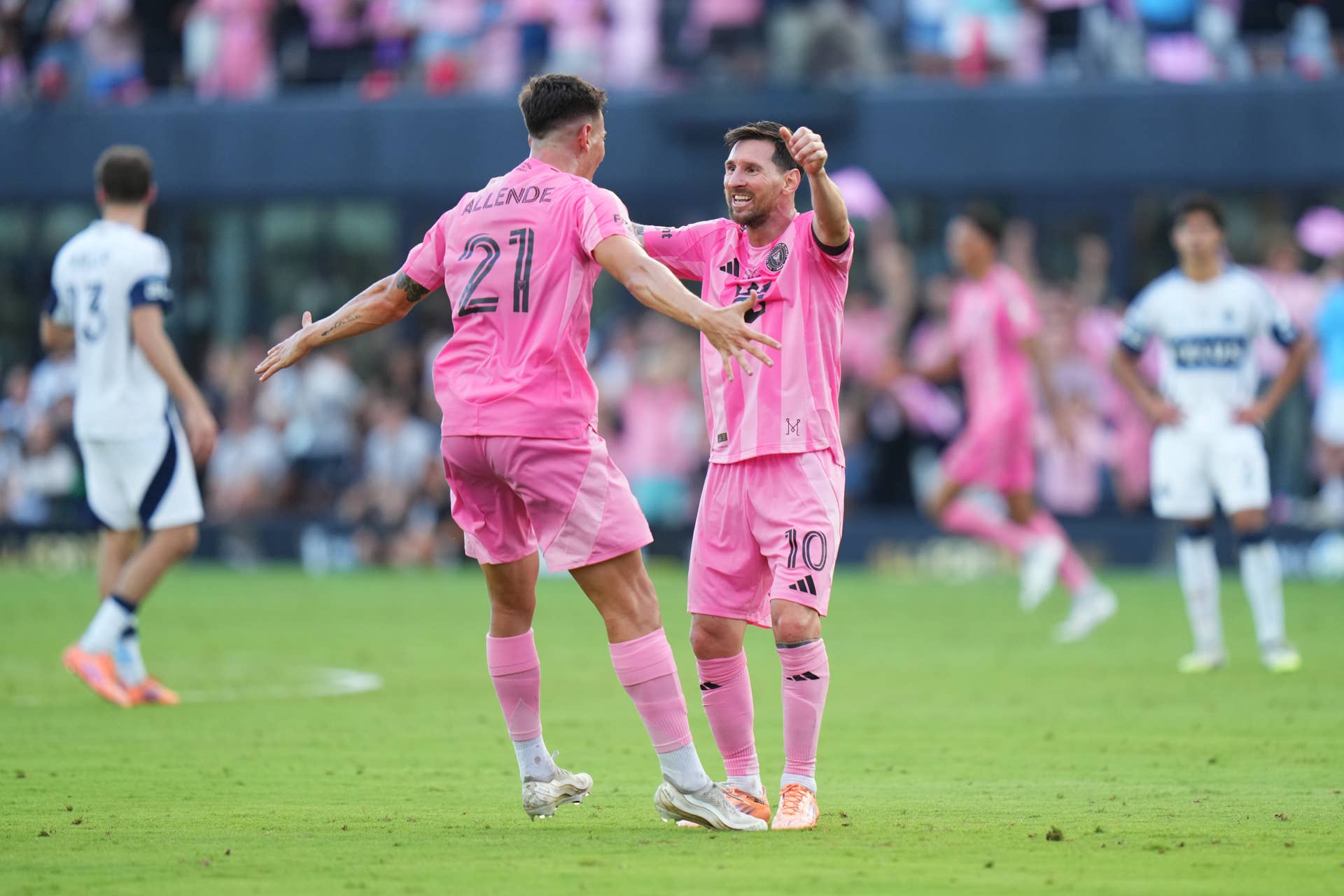 Lionel Messi #10 and Tadeo Allende #21 of Inter Miami CF celebrate winning the Audi 2025 MLS Cup Final match between Inter Miami CF and Vancouver Whitecaps FC at Chase Stadium on December 06, 2025 in Fort Lauderdale, Florida.