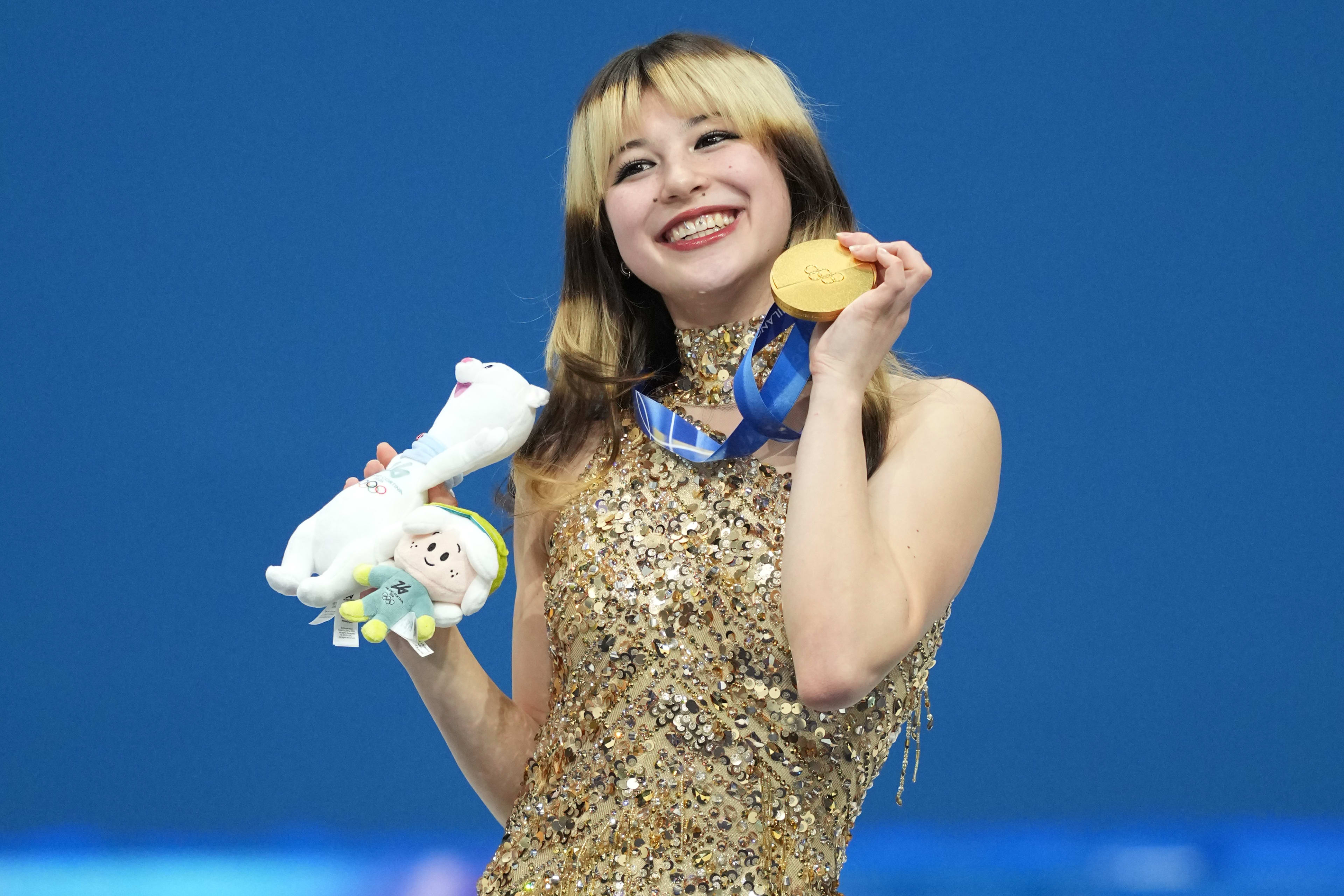 Alysa Liu of the United States celebrates with the gold medal in the women's free skate during the Milano Cortina 2026 Olympic Winter Games at Milano Ice Skating Arena in Milan on Feb. 19, 2026.